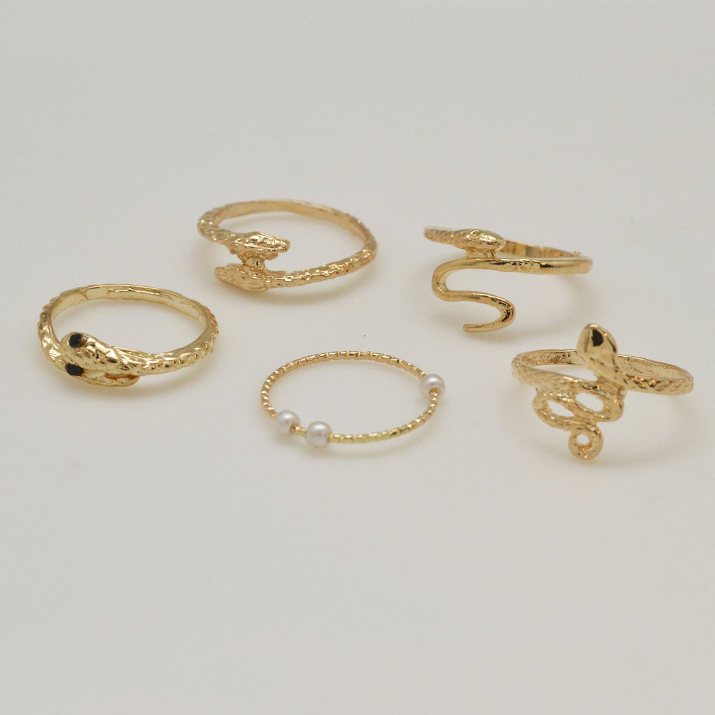 Set de 5 anillos de serpiente en color dorado